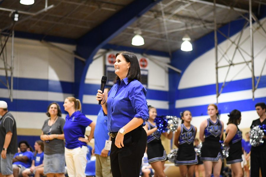 Principal Brandi Hosack takes the mic during the Back to Mac pep rally, an event that she orchestrated very early in her tenure as principal. Photo by Bella Russo.