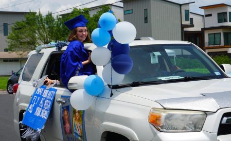 McCallum senior Molly Gardner attends the class of 2020 drive-by graduation parade on May 28. The parade has been one of the few on-campus events that have taken place since COVID-19 prompted the closure of the campus on March 13. Photo by Evelyn Griffin.

