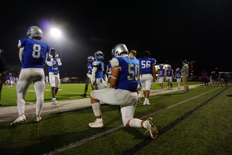 Senior lineman Charlie Pecina kneels, taking in his last few moments on the field at House Park as a McCallum football player. Pecina said the team was optimistic heading into Fridays bi-district playoff game. “Going into the game I knew we had to win or else it would be my last game in a McCallum jersey, but I felt confident because the coaches and the team felt like we had a good week of practice.” The game was a tough one as the Knights lost several players to injury or penalties. Despite the attrition, Pecina said he and his teammates left all they had on the field. Pecina made one of the games best plays for the home team, a first-quarter interception the extinguished a Patriot scoring threat. “Things didn’t go our way with calls and injuries, but that doesn’t matter. We still played our game and still put the most effort we could into the game.” Although the game was a loss, Pecina focused on the progress he, and his teammates have made. “Even though we lost I was proud of how far we came from only winning one game our freshman year to having a winning season and making the playoffs.”