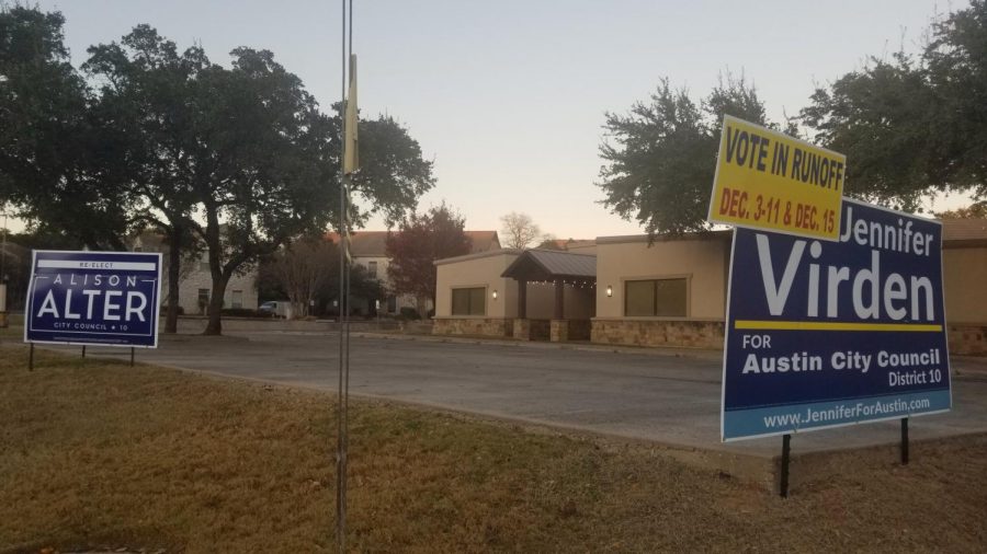 DUELING SIGNS IN DISTRICT 10: Spicewood Springs Road just off Mesa was the site for two large signs each representing one of the runoff candidates for the District 10 City Council Post where incumbent Alison Alter faces the challenger Jennifer Virden. A drive down any street near Anderson High School would reveal that neighbors are split between the two candidates.