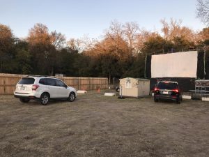 Pulling in, cars begin to park in preparation for a movie showing at the The Blue Starlite Drive Ins Mueller location in East Austin. The theater functions with five movie screens -- three for drive in and two for walk in -- that allow for multiple showings throughout the night. 