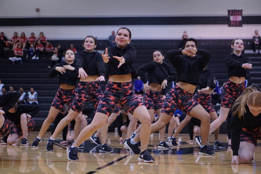 Senior Valentina Paredes performs a hip hop routine with the Blue Brigade at the Austin Dance Classic in February 2020. Valentina says that between the two sisters, Andrea has an eye for contemporary dance and Valentina is stronger at hip-hop routines like the one she is performing.  “Andrea has done a great job choreographing more contemporary routines,” Valentina said. “And we both edit the songs, and that’s something we do together for most of the dances we do on Blue Brigade. And then I could say I’m good at choreographing hip-hop routines and jazz. So we do different styles in dance.”