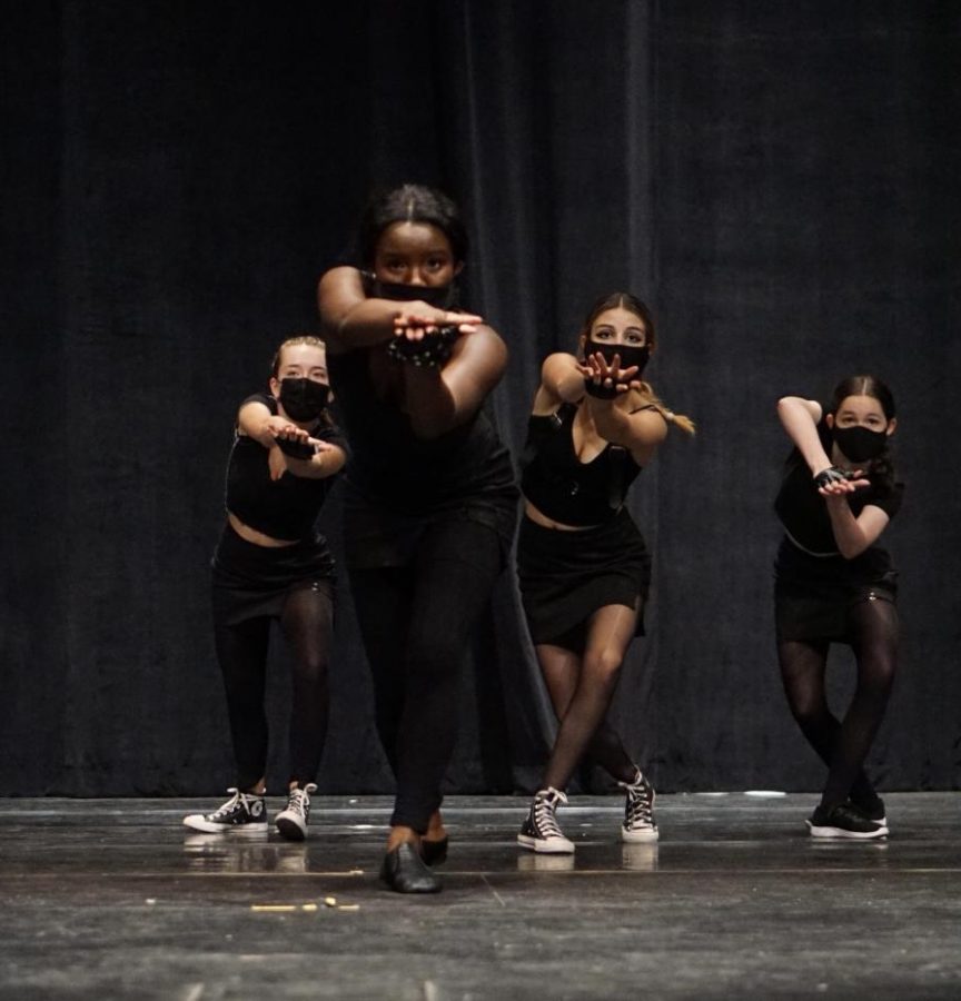 In the jazz dance number, “History Repeating,” Parker Mitchell, Wynter Winston, Maddie Hello and Samantha Bogle dance with the mindset that they are spies hunting their next target and looking for who might be targeting them. Winston said she was excited to perform this dance, choreographed by the B. Iden Payne Award-winning Sara Burke, because it was one she had learned the year before and was scheduled to perform it at the 2020 spring dance show. “We had to put it on hold due to COVID,” Winston said. She said she didn’t really have a favorite number in last weekend’s show but rather enjoyed the whole experience. ”My favorite moment from this weekend overall was just being in the MAC again with all my dance friends. It was back to familiarity.”