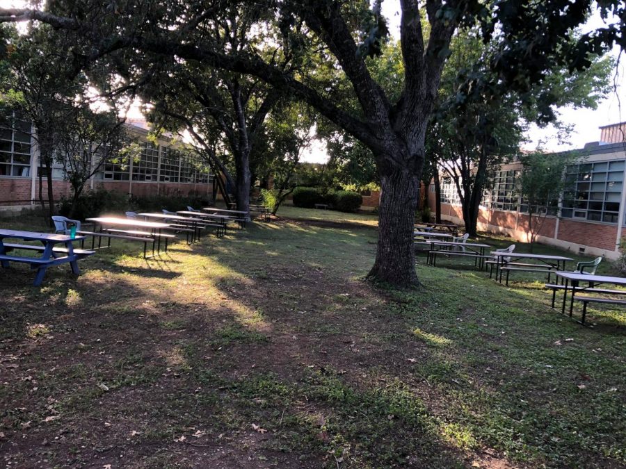 For the second stage of the project, six parents and four students cleaned up the courtyard between the science labs and the foreign language hall and added 10 more picnic tables. They also added 10 Adirondack chairs in front of the main building. 