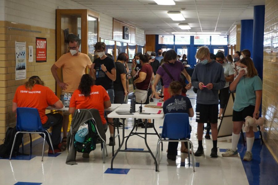 Community members wait in line at the vaccination clinic, held on May 14 at McCallum. The clinic, which offered shots to anyone 12 and older, ran from 3:30-8 p.m. and administered 383 shots.