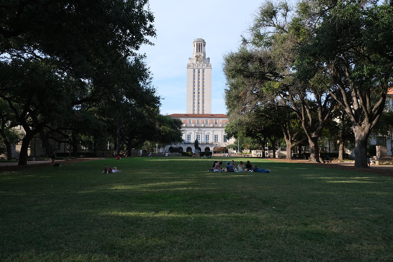 University of Texas students collect in the grass outside of the UT tower. Some wear masks, others do not, as they socialize after almost a year and a half of online school. “Campus now feels really lively,” UT professor Stephanie Holmsten said. “Students are walking about campus, there were student organizations set up on campus. There were folks enjoying the beautiful weather on the south mall. So students are back and you feel it, you feel it on the sidewalks. Students who maybe spent COVID in their childhood homes have come back to Austin.”
