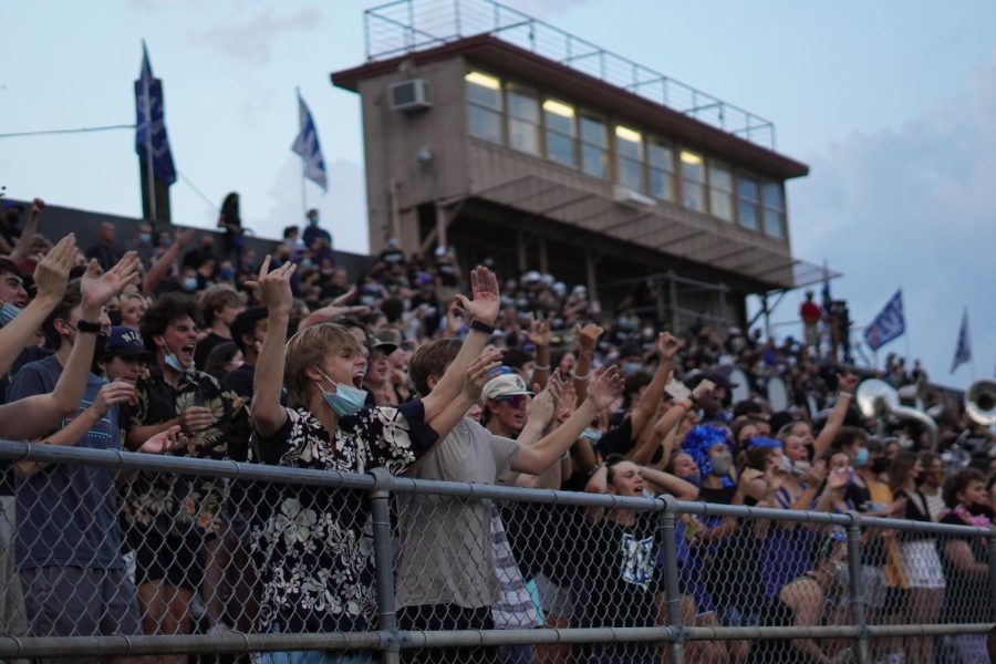 The student section of this House Park stadium cheers during this years Taco Shack Bowl. Despite a masks being required for the event, the policy was not well adhered to by all attendees.