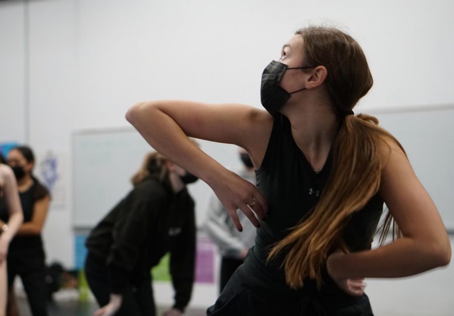 Senior+Sydney+Lowe+rehearses+for+the+winter+dance+concert+during+the+fifth-period+pre-professional+dance+class+in+the+black+box+theater+on+Dec.+2.+While+dance+director+Rachel+Murray+said+the+dance+program+is+grateful+to+the+theatre+program+for+letting+the+dancers+use+the+venue+for+dance+classes%2C+the+program+longs+to+have+a+dedicated+space+of+its+own.+Construction+on+the+new+dance+studio+will+begin+this+summer.+