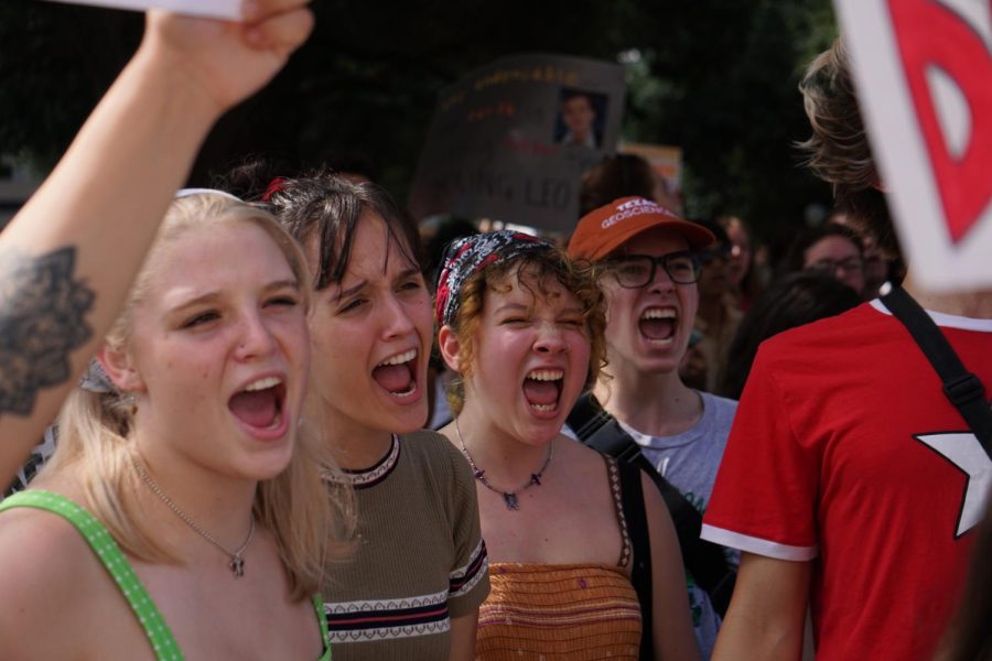 A GLOBAL CRISIS: McCallum students Ruby Henson, Abby Green, Louisa Najar, and Sabri Amrani participate in the rally cries at the Austin Climate Strike. These young climate activists stand before the capitol and call, “This is our climate; we are the change.” Najar believes that the prevention of the impending climate crisis is a cause that unifies people all over the world. “Global climate change is universal. It affects all people,” she said. “[It affects them] at different levels, but it affects everyone, no matter what.”
