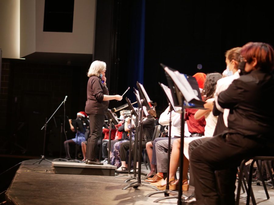 Ms.Nelson conducting the band at the Band Winter concert on December 7, 2021. She shows great leadership to everyone.