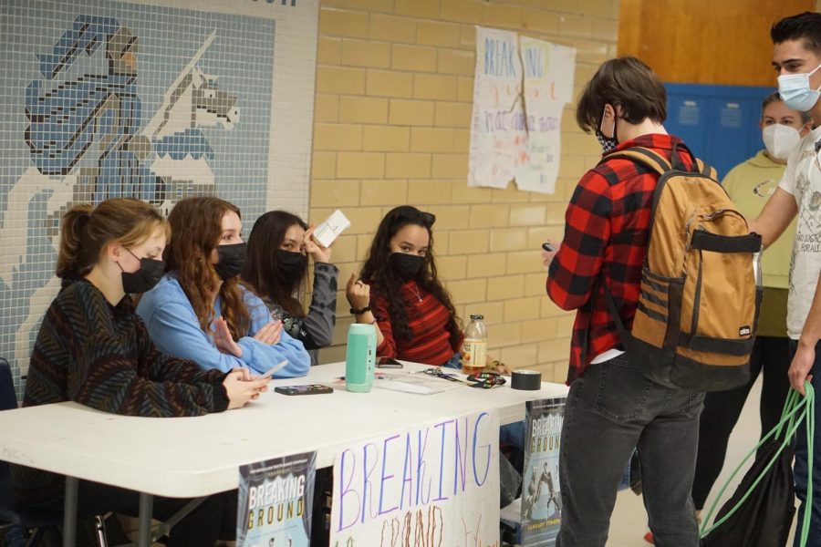 Dance students selling tickets for the winter dance concert,at lunch.