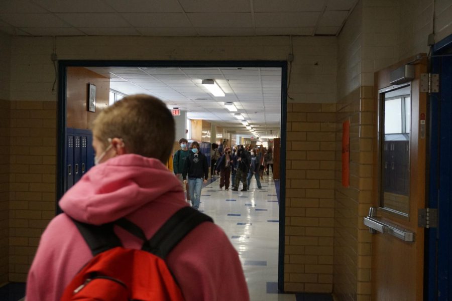 Students walk in the hallways at Mac during lunch after Austin moved to Stage 5 in COVID-19 risk guidelines.