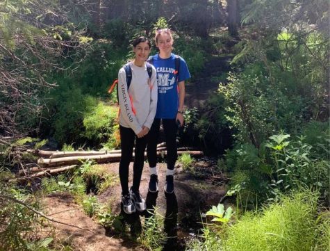 The Nabhan sisters. senior Sydney and junior. Rachel pose while on a hike in Colorado wih the rest of their 
family. Both sisters cite activities off the court as their best bonding-experiences.