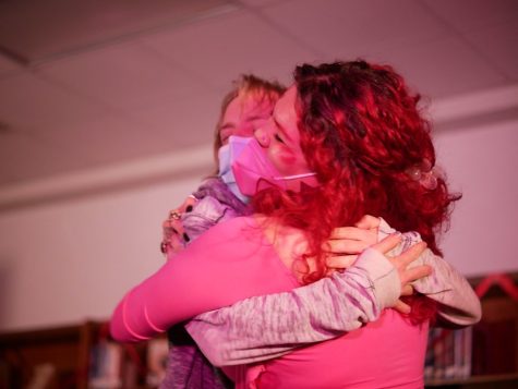 CORE MEMORY: Following senior Ocean Reilley’s performance of an impromptu Irish drinking song, he and senior Eden Goodman embrace. “I was overwhelmed with happiness,” Goodman said. “It was like, ‘Core memory: unlocked.’” Photo by Madelynn Niles. Reporting by Alysa Spiro.