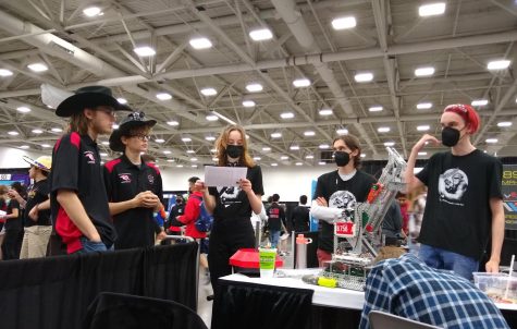 The Apes strategize with team 1233G, the UnderDogs, from Indiana during the Vex Robotics World Championship in Dallas.