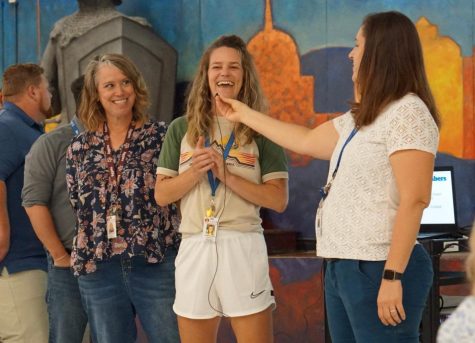 During the first faculty meeting of the school year, principal Nicole Griffith welcomes new social studies teachers Jennifer Richter and Catherine ONeal.
