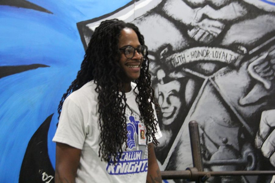 Football+coach+and+lifestyle+fitness+and+wellness+teacher+Kee+Stewart+smiles+as+he+returns+to+McCallum+after+his+graduation+in+2007.+