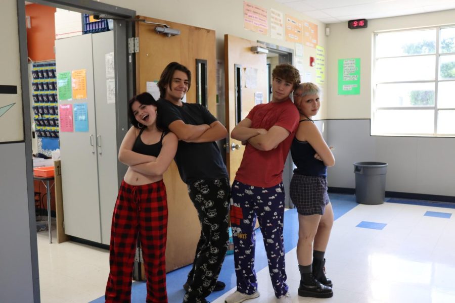 Freshmen Elli Grace Hodges, Eli Finnegan and seniors William Wheeler and Josie Bradsby pose in their Pajama Day outfits. Wheeler decided that his Snoopy pajamas were perfect for the first day of Spirit Week. “Half the school showing up in their PJ’s on Monday morning was a telltale sign that the rest of the week was going to be a blast,” he said. “Year after year it’s fantastic to see the McCallum community rally for homecoming week and pajama day will always be an iconic start.”