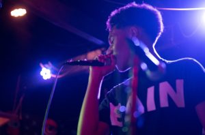 Junior Mateo Jones performs at Tunnel Vision in July 2022. Performing live provides motivation for Jones. [Concerts] really got me really interested in making music again, Jones said.