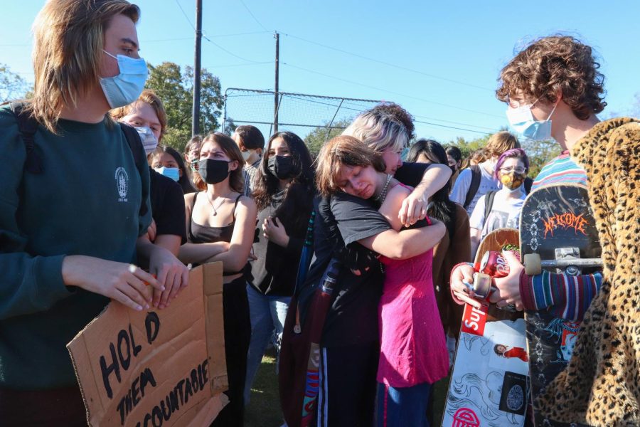 NSPA Digital Story of the Year winner

Staff, photo slideshow, first place

"STANDING UP, WALKING OUT"

After marching around the perimeter of the school, students at yesterday’s walkout regrouped by the baseball fields to share their stories of assault. Genevieve Henley was one of the students who decided to share. “It was my first time really sharing my story with anyone but close friends,” Henley said, “It was a lot harder than I thought it was going to be.” Afterwards, her friend Bri Wilson comforted her. “I was just really emotional,” Henley said.