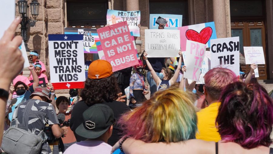 NSPA Photo of the Year winner

Elena Ulack, news photo, honorable mention

PARENTS OF TRANS YOUTH PROTEST AT CAPITOL

Trans youth parent Susan Mack attended the Trans Youth Rally at the Capitol on March 1. “My trans kid is beautiful,” Mack said. “From the time that they came out, theyve really helped me change and grow my perspective and be more empathetic to everyone who is trans.” Mack gave a powerful speech about when she first became aware of the legislation and how she wanted to hide her head in the sand like an “ostrich.” She didnt want to accept the reality for her child. After doing some reflection, Mack realized that the only way to protect her child and other trans children is to fight for them and try to vote out of office the people currently attacking them. “What I found is that kids need help, not just my kid, but all trans kids, because trans kids are kids,” Mack said. “Hopefully [people showing up today] will help them know that there are a lot of Texans who do actually support them.”