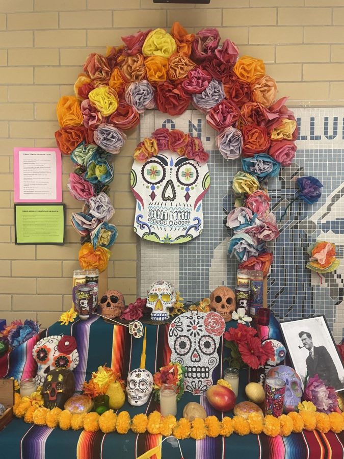 Spanish teacher Graciela Rios-Tiessen and National Art Society worked together to make an altar in the main hallway as a way to honor their families. Many students participated in the decorations.  