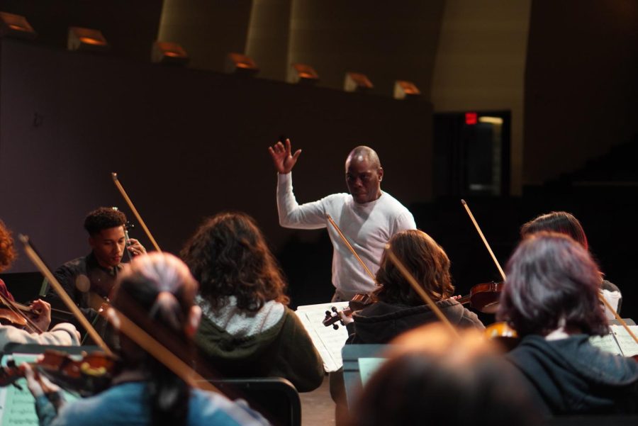 A GRAND OPENING: To kick off A Knight at McCallum showcase off, the orchestra played a piece from “Spirituals for Strings” by Morton Gould. The music was supposed to imitate a train, which is what makes it such a crowd-pleaser according to first violinist Ingrid Smith. 

“My favorite part of the night was that we got to open the showcase,” Smith said. “I’m super proud of the orchestra for putting on an awesome performance that I’m sure the audience loved.”

Smith hoped that the show helped inspire current middle-schoolers to come to McCallum for high school. Back when she was in their place, Smith remembers the orchestra putting on a very passionate performance which she enjoyed listening to. 

“It’s crazy to think that I’m in their position now,” Smith said. “I’m so excited for the next generation of Mac orchestra students to experience the amazing things the program has to offer.” Caption by JoJo Barnard. Photo by Morgan Eye. 