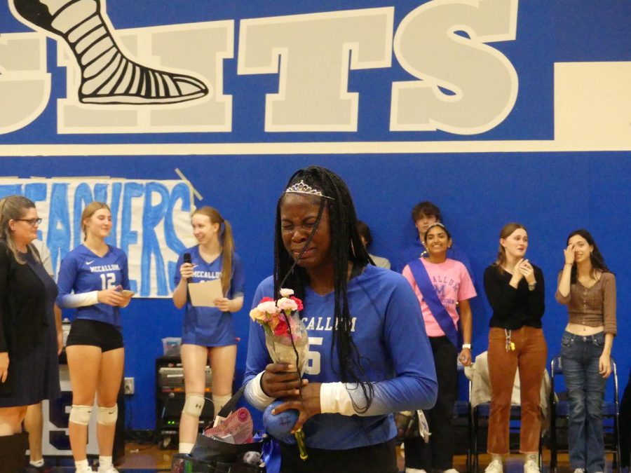 NEVER CAN SAY GOODBYE: Senior Jayden Mason breaks into tears after being honored by teammates and coaches at the volleyball Senior Knight. To Mason, the ceremony was emotional because of the change that it represented.

“[It was] the fact that I’m leaving soon. It’s a big change, a new branch of independence and decision-making,” she said. “I’ve known a lot of these people for quite a while, and after high school this may be my last time seeing them.”

Ultimately, seeing her teammates being showered with gifts and speeches was what brought on the waterworks. Mason will miss the people and routine provided by the McCallum volleyball program.

“I’ve done volleyball all four year so it’s going to be hard not having that daily task in my routine. I’ve created lots of friendships so it’s going to be hard [to say] my goodbyes.”

Photo by Julia Copas. Caption by Francie Wilhelm.