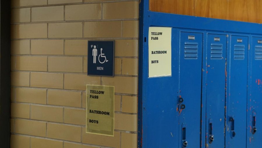 A yellow sign marks the  math hallway as a yellow bathroom zone. Each bathroom pass is color-coded to a specific bathroom that students must go to to keep them in the general area of their classroom.