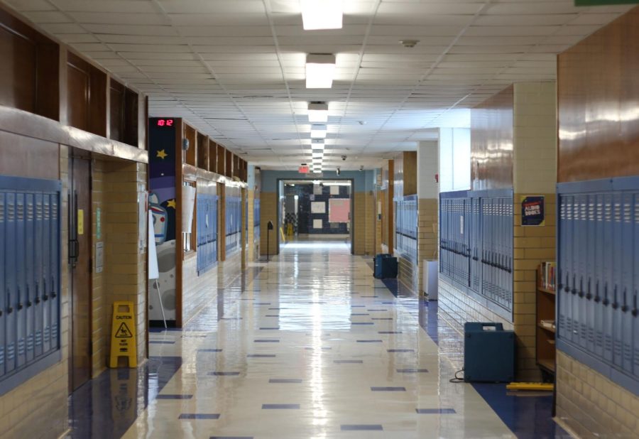 Under the new district security policy, all  classroom doors must be shut and locked. The library falls under the new locked-door policy and now requires students to ring a doorbell to be let in.