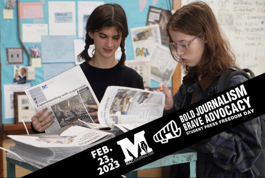 Photo of juniors Lanie Sepehri and Meredith Grotevant preparing for distribution of Issue 2 of the Shield.