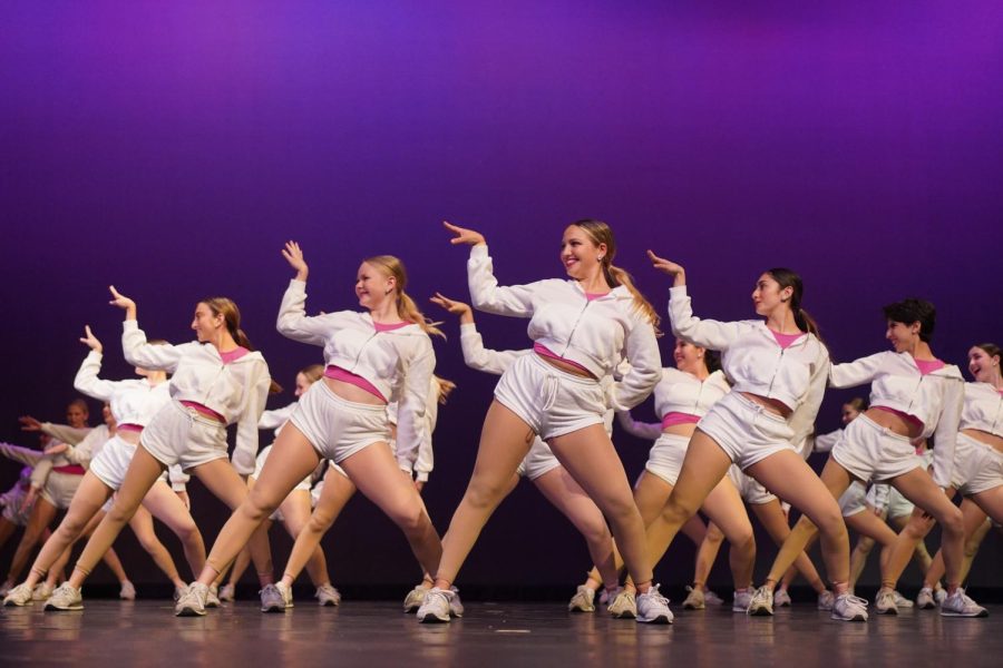 ‘ONE TWO’ THREE GO: Seniors Nia Wayman, Sophia Kramer and Olivia Falcon lead the team’s formation in hip hop number ‘One Two Step,’ choreographed by Caroline Cullers. Wayman enjoyed conveying the intensity of the number to the audience. 

“My favorite part would have to be the headspring whackpack kip-up,” Wayman said.

Overall, though, Wayman found this year’s spring show to be bittersweet as she said goodbye to the people and program that had been a part of her life for so many years. 

“I was excited throughout but I was also sad that it was the last time I would dancing as part of Blue Brigade,” she said. 

Caption by Francie Wilhelm.