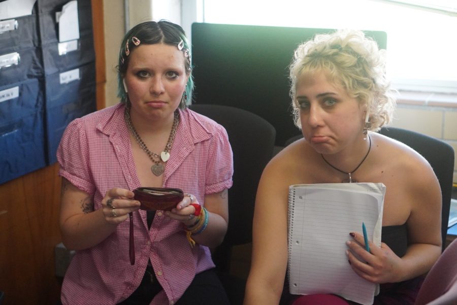 Bradsby and Reedy sit side by side in their 7th period newspaper class.