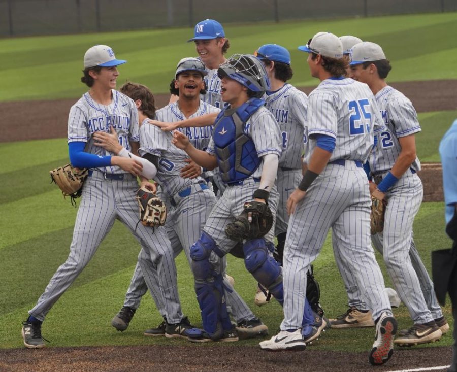 Pitcher+Sam+Stevens+and+catcher+Pablo+Lopez+are+mobbed+by+celebrating+teammates+after+Stevens+struck+out+two+batters+to+strand+the+potential+game-tying+run+at+third+base+to+end+the+game.+Nathan+Nagy+gave+the+Knights+a+2-1+advantage+with+a+home+run+to+lead+of+the+top+of+the+seventh%2C+and+Lopez+delivered+the+game-tying+single+that+drove+home+Stevens+in+the+top+of+the+sixth+with+two+outs.+The+Knights+face+Lake+Shore+in+the+area+playoffs+next+week.+