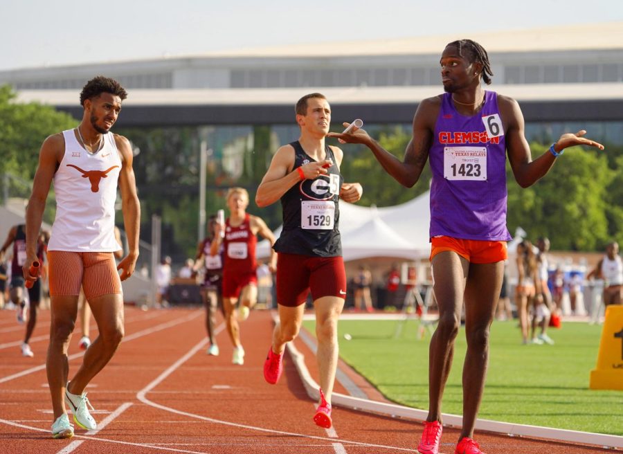 TIGERS TALE OF THE TAPE: Clemson junior Tarees Rhoden reacts to the Tigers’ victory in the finals of men’s 1600 sprint medley on Friday March 31 at Mike A. Myers Stadium. The Tigers won the race in 3:14.02, less than a second of a second faster than Yusuf Bizimana and Texas (3:14.81). Clayborn Pender ran the anchor leg for Georgia, which finished fourth in 3:17.11, just behind third-place Arizona State in 3:15.17. The Longhorns led at the halfway point by a half-second, but the Tigers caught them in the final 800 meters.