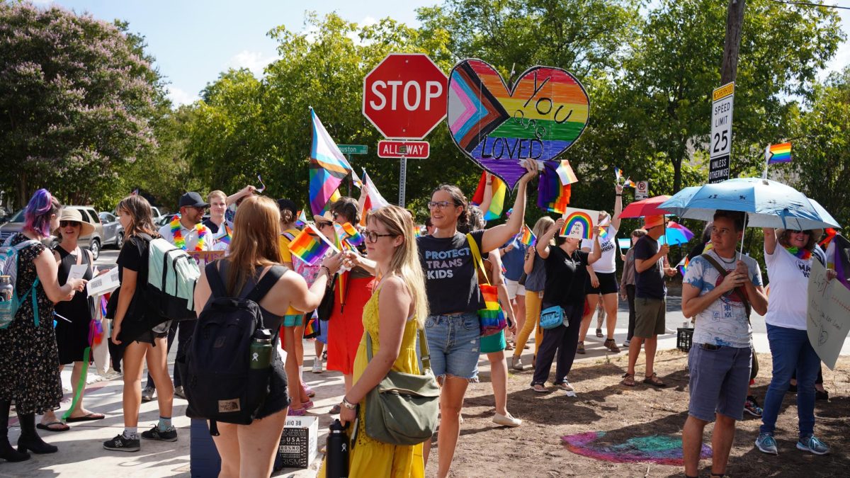 Parents gathered at the corner of Houston Street at the end of the day on Wednesday to show support for the LGBTQ+ community and combat the previous days negativity. 