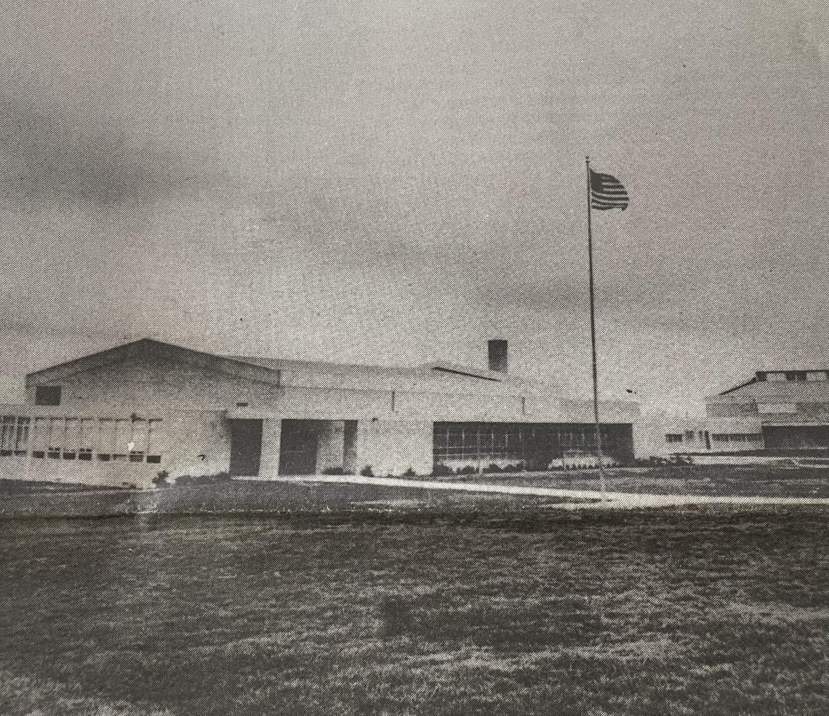 The original school plant looked considerably different than the students see now as they approach the front entrance. Remodeling done in 1984 added space and changed the front to the impressive columned structure it is today. Caption by unknown staffer