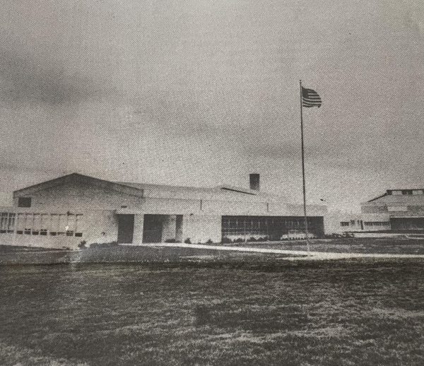 The original school plant looked considerably different than the students see now as they approach the front entrance. Remodeling done in 1984 added space and changed the front to the impressive columned structure it is today. Caption by unknown staffer