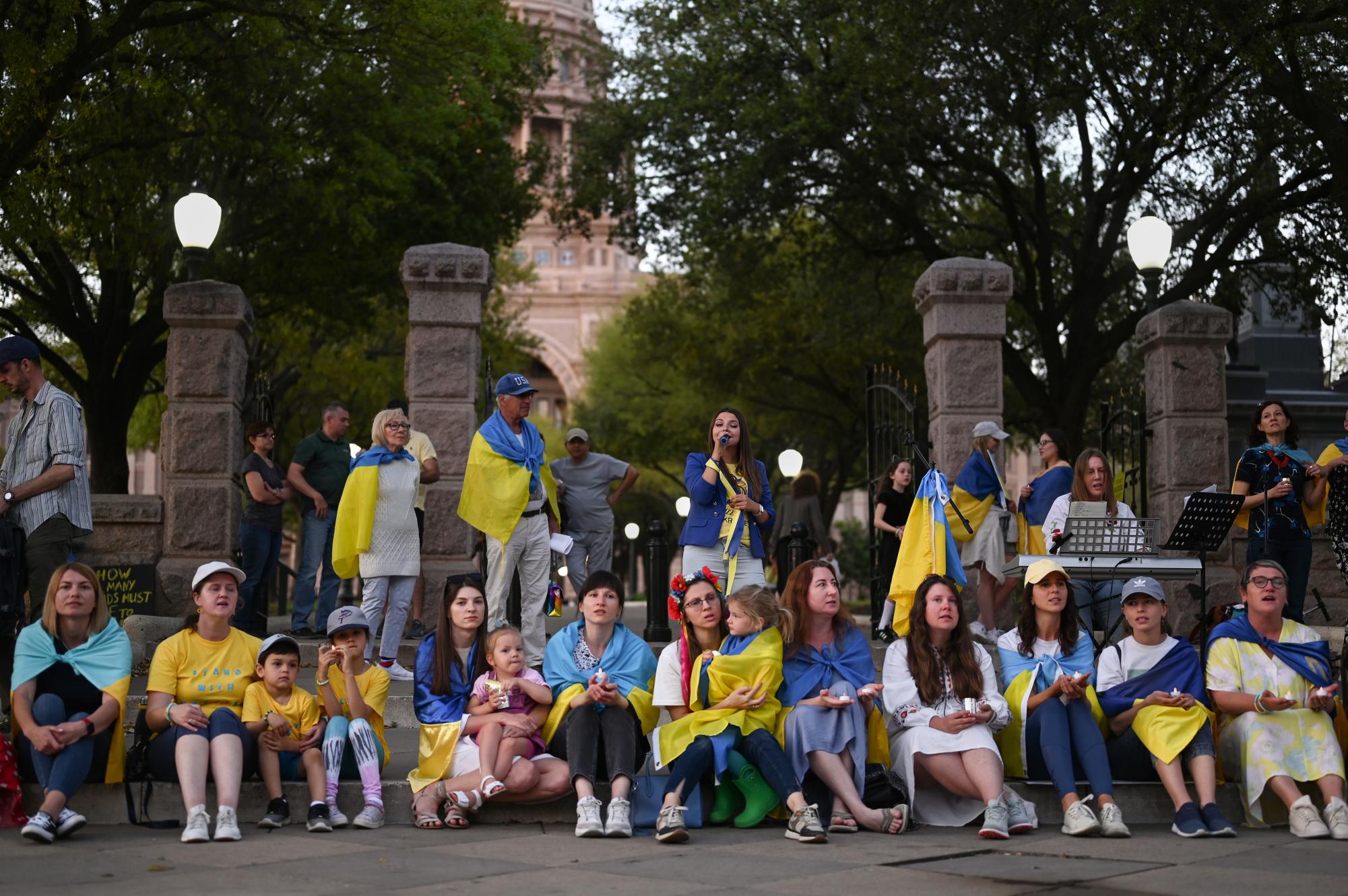 Protestors sit on the front steps of the Texas state Capitol at a rally organized by the Austin Ukrainian community. According to Darya Ledesma, co-founder of the nonprofit AHEAD Ukraine, Austin Ukrainians are often joined by Americans at the rallies. Im right there on the streets in front of the Capitol, Ledesma said. We have cars honking, we have people who come up and express their support. I think we have the same support as we did a year ago. Photo courtesy of Kate Voinova.