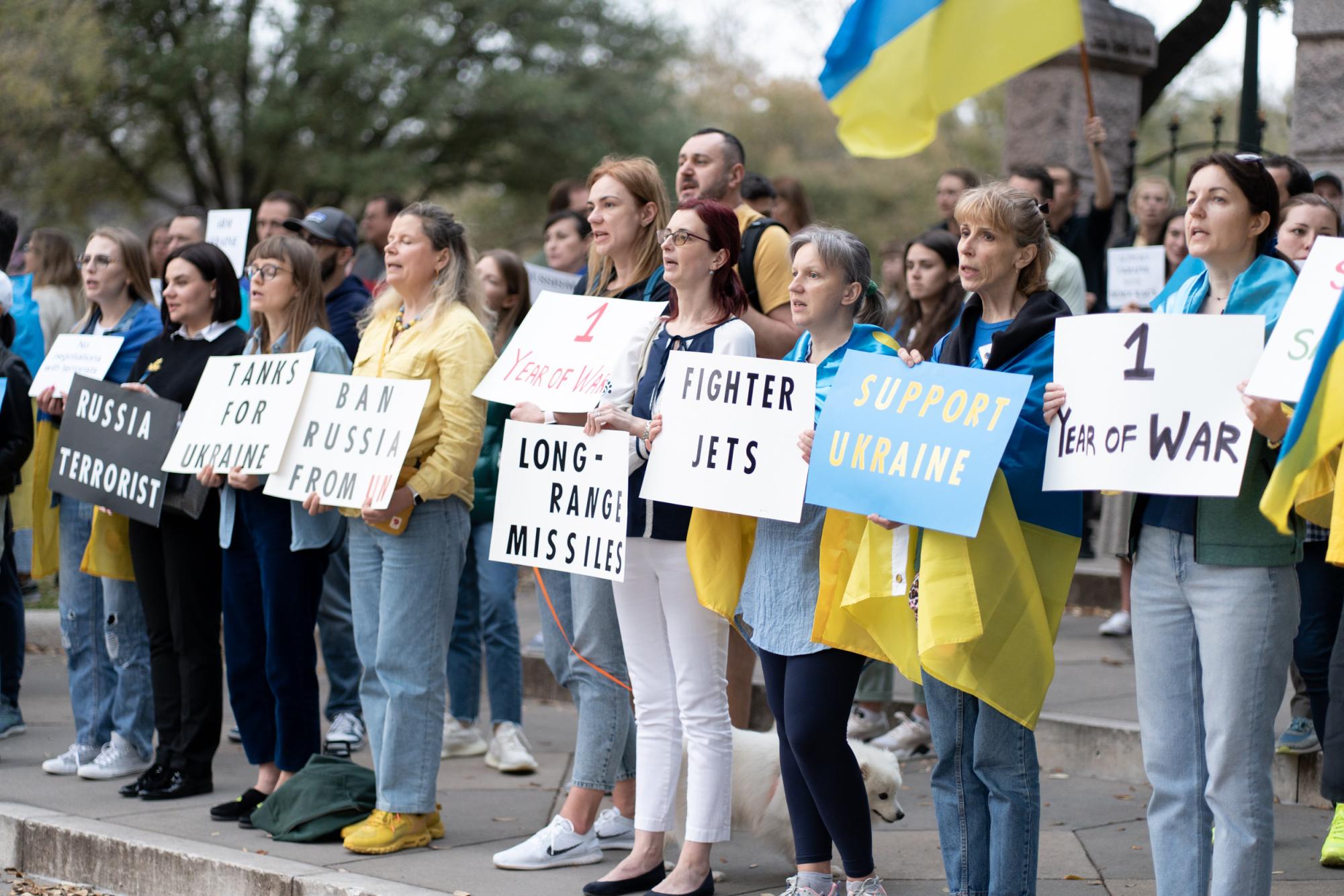 Protestors hold signs advocating increased aid to Ukraine outside the Texas state Capitol building. Darya Ledesma feels that America should give increased aid to Ukraine in the form of weapons and defense materials. According to Ledesma, the discrepancy between Russian and Ukrainian arsenals is too great for Ukraine to quickly win the war. Russia has [weapons] in huge amounts — Ukrainians dont, Ledesma said. Then [Americans] say Okay, were not giving you [weapons] and we expect you to do a spectacular offensive. What are we, animals in the circus? Honestly, I am just frustrated. Photo courtesy of Kate Voinova. 