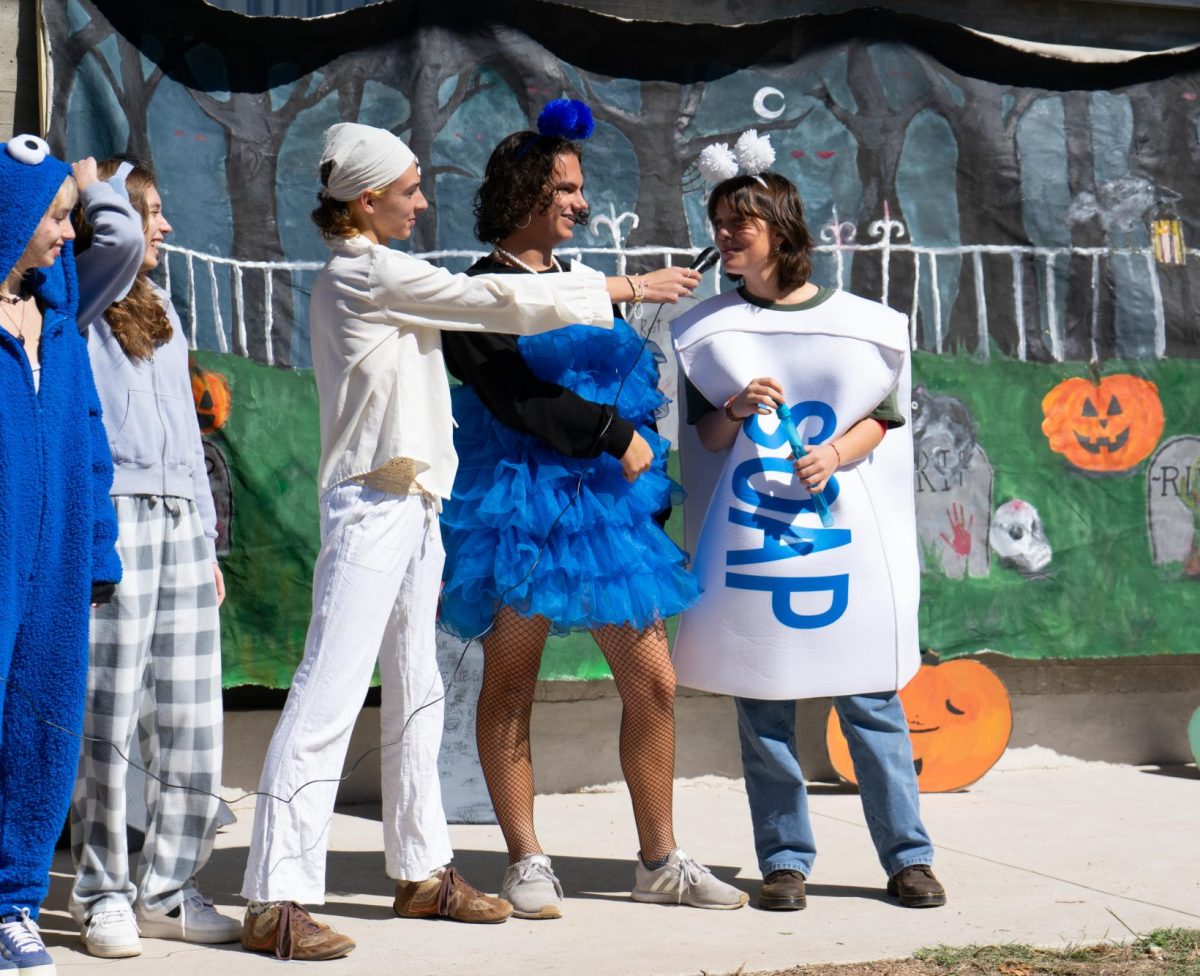 CLEAN WINNERS: For senior William Viner and junior Isa Perez, finding the perfect group costume was an important feat. The duo contemplated a few different options for costumes until finally landing on soap and loofah. 

Viner took on the loofah role, while Perez dressed as soap, creating the duo costume. 

“We went to Spirit Halloween to find inspiration for our costume,” Viner said. “We fell in love with soap and loofah instantly.” 

The two dominated the hallways taking the opportunity to show off their costume to passersby. 

“We got bubbles to blow while we walked around,” Viner said. “And that tied it all together.”

While it wasn’t the original intent to join the costume contest, Viner decided it was a no-brainer to enter. 

“I loved getting together the little accessories to go along with the costume,” Viner said. “We got matching earrings and headbands.” 

By entering the contest, the two not only got to show off their custom costumes, but won the award for best group costume.

Caption by Chloe Lewcock. 