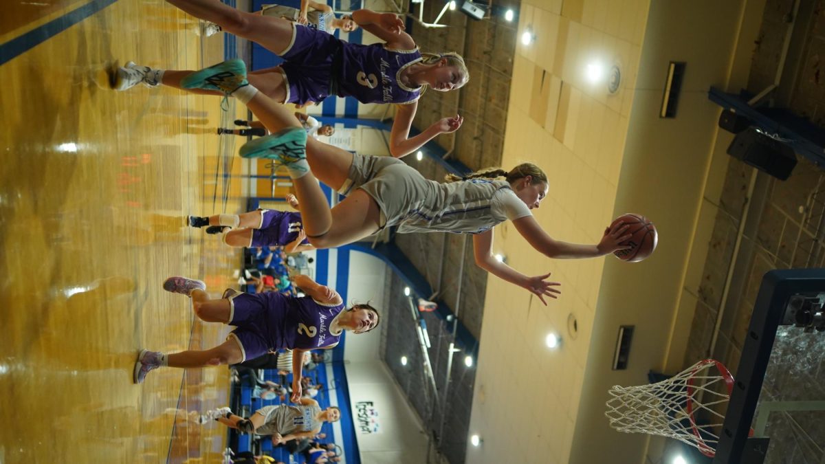 Ella Burns goes up for a layup during the JV game against Marble Falls