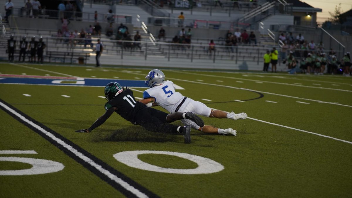 Junior Mitchell Butler gets tackled
