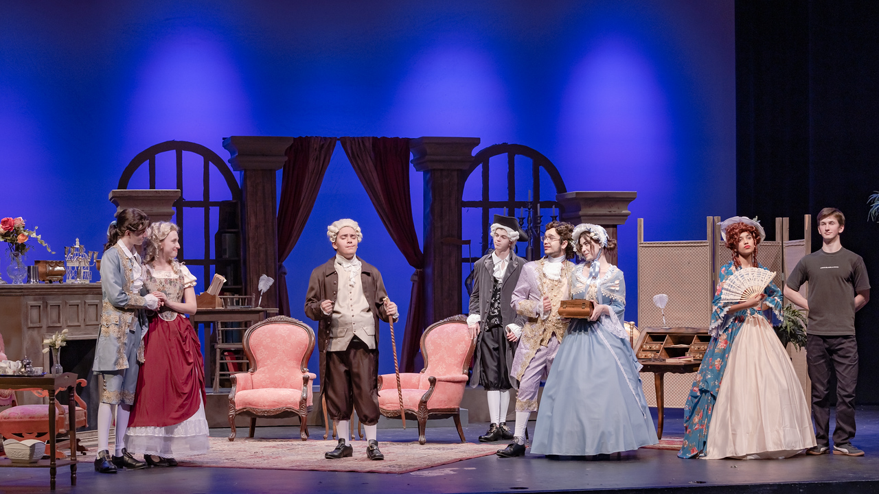 The ensemble of She Stoops to Conquer runs through a production before the UIL competition. Photo courtesy of Bonnie Brookby.
