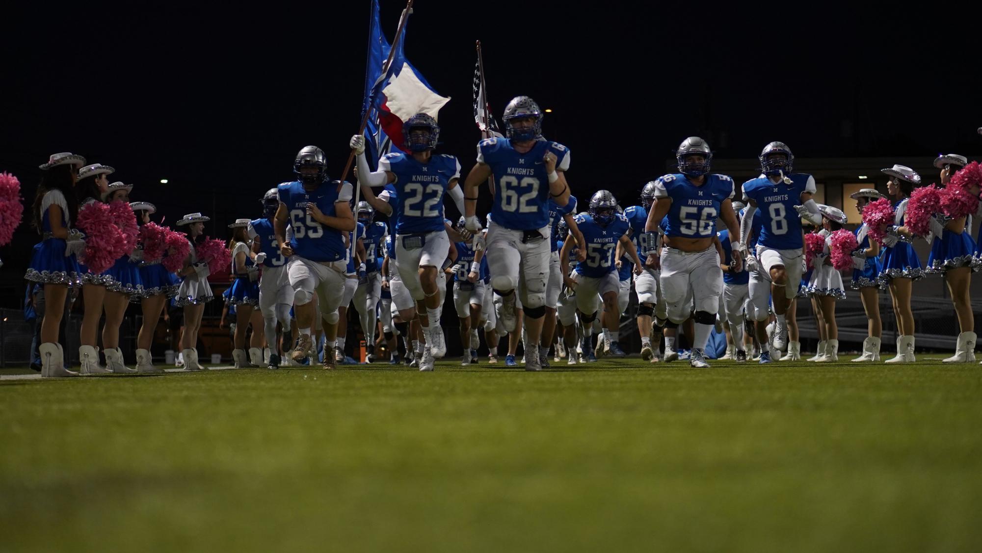 The Knights take the field ahead of their shutout win over Navarro last season. This win was part of a five-game win streak to end their regular season play and help them advance into the playoffs.