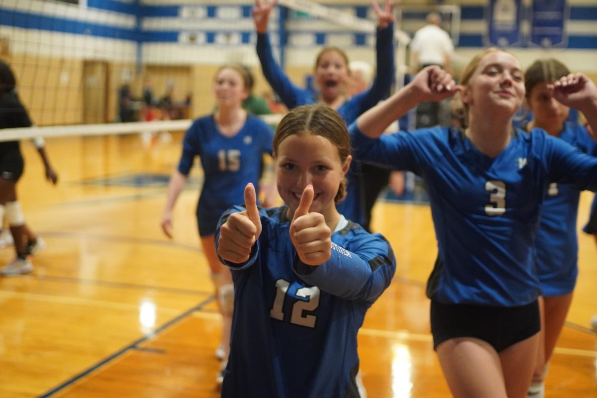 After coming back from 11 points down to finish off Connally in straight sets to open play in the Knight Freshman tournament on Sept. 5, Sylvia Hurtado gives a thumbs up as her teammates exit the court in celebration.