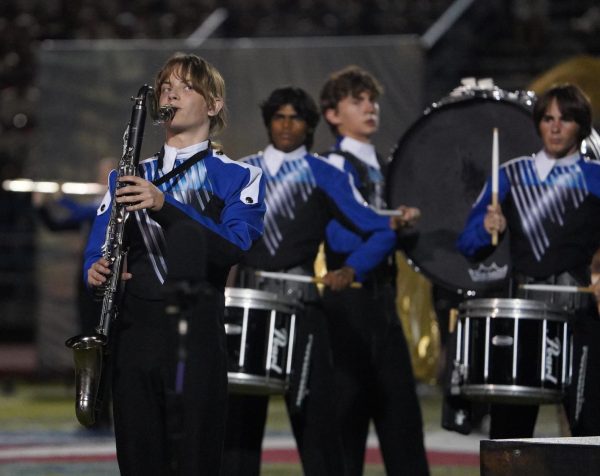 Junior Lucas Walker, plays the bass clarinet during the finals performance Saturday night at the USBands Austin Regional Competition at the Bob Shelton Stadium in Kyle. This performance led to a third place finish and the band to be awarded best overall music.