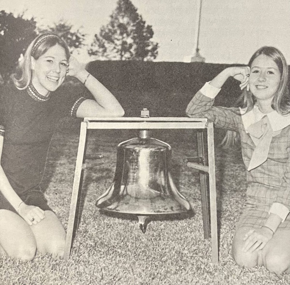  Knight and Shield editors, Karen Behrens and Cathy Croft prepare to guard the victory bell.