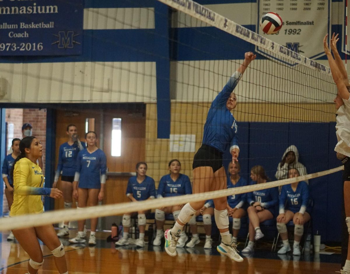 Sophomore Annabel Johnson tips the ball over the net during the Knights come-from-behind victory over LASA in the Knight JV Tournament gold-bracket semifinals. The Knights would end up finishing second after losing to Bowie in the championship match.