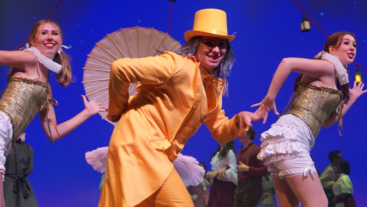 Senior Joe Colaleo performs 'Everything's Golden" with sophomore Elora Clarke and senior Sophia Rayas at the opening of Tuck Everlasting.